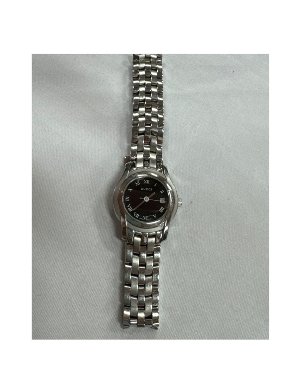 Gucci 5500L women’s stainless steel watch with date